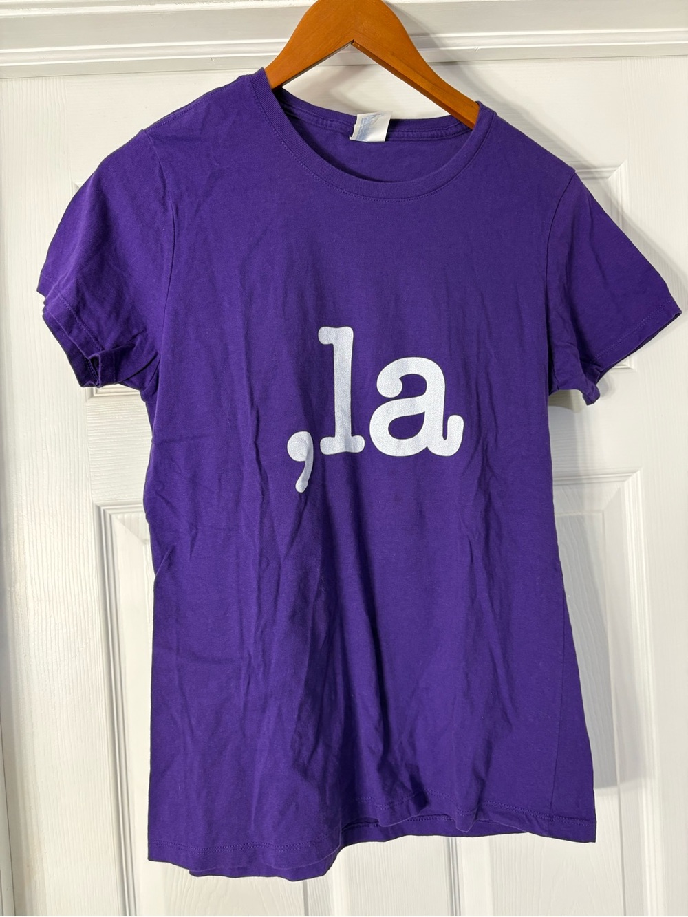 Port and Company Purple Tee with White ",la" Graphic